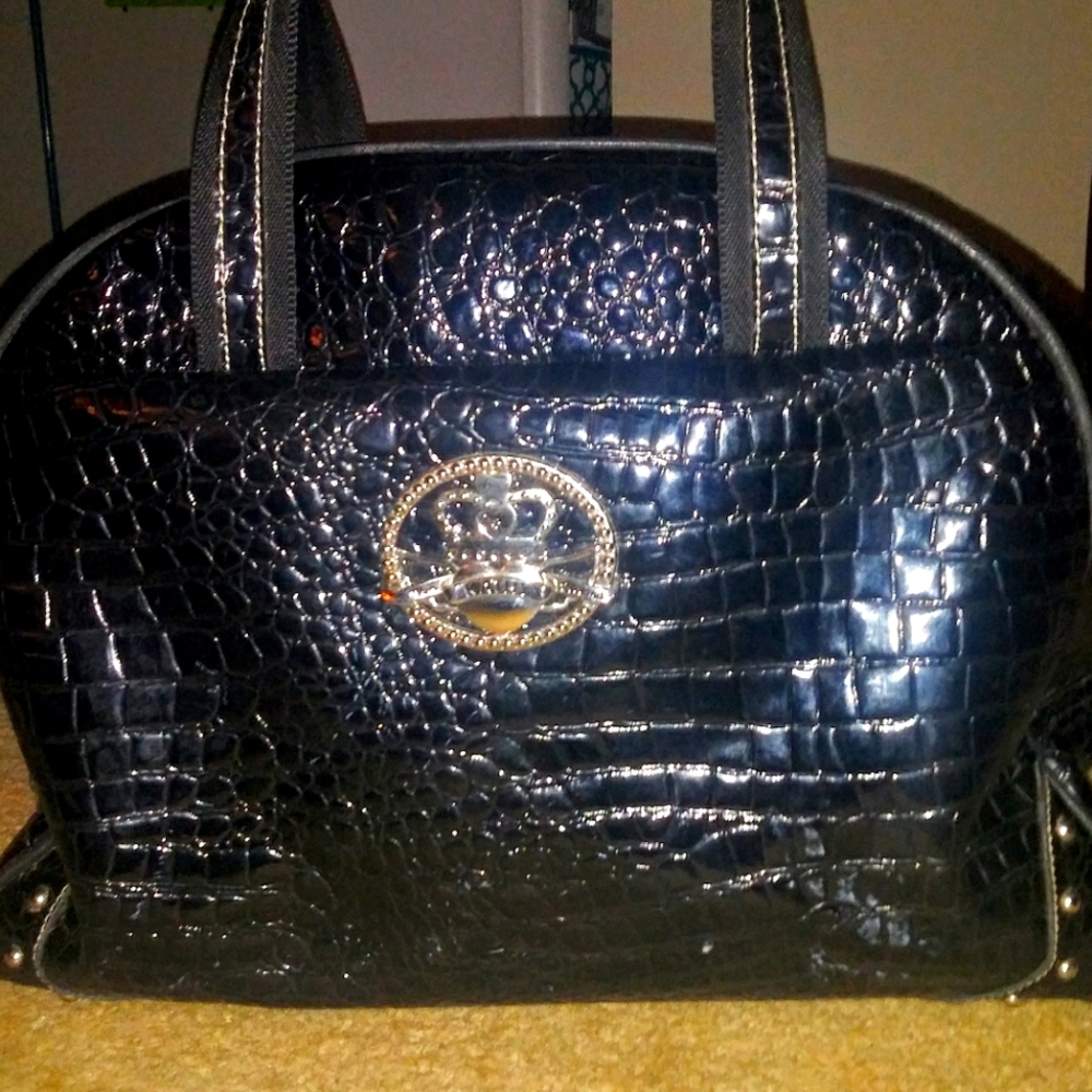 Kathy Van Zeeland tote weekend carry on bag.